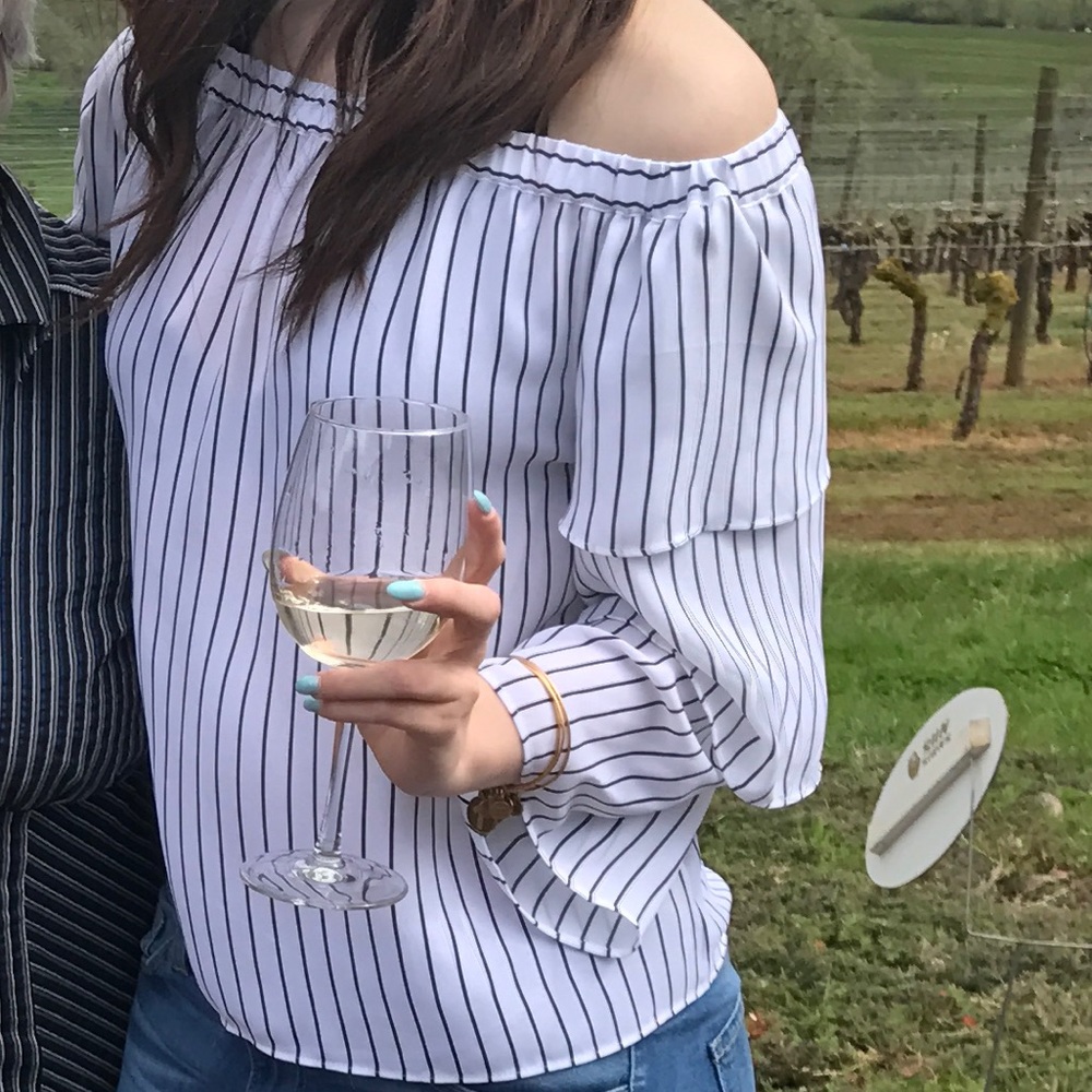 Off-the-shoulder pinstriped blouse